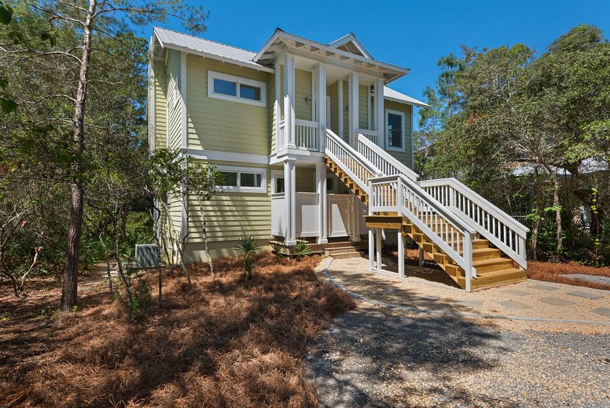 Sleek, Modern, Renovated House in Private Lakefront SettingThis cozy, very private, sparkling clean, lakefront cottage is the Florida home for you. Tucked into a gated neighborhood among magnolias, towering pines and moss-covered oaks, the 2-story charmer with tower has enchanting decks along the back overlooking a rare slice of wilderness and marshland. The white interior reflects natural daylight in every room, and a sleek, modern Scandinavian-style kitchen sports new white cabinets, stainless steel appliances and countertops. This is move-in ready to the max.A delightful community boardwalk to the water and dock is like a secret passageway under the canopy of branches, and the community pool is sure to please. Part of the privacy and charm is the location down a private drive,