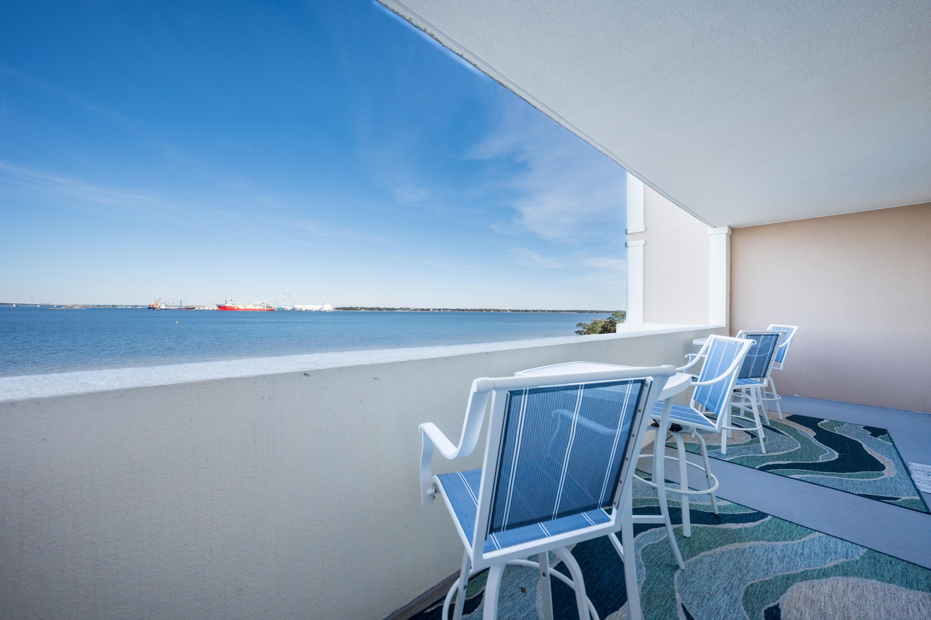 UNDER CONTRACT TAKING BACK UPS WITH 72 HOUR KICKOUT CLAUSE Magnolia Bay Condo beautifully updated three bedroom. Large floor plans are perfect for year round living or large family extended stays. Three full bathrooms with two master bedrooms. Overlooking St. Andrew's Bay, the port, bridge, and Navy base there is always something nautical to watch. These prized fourth floor units offer additional privacy. The gated complex has a pool, bay front exercise room, community lounge, dock, and covered assigned parking. There is also a storage room and the deck furniture is included in sale. No short term rentals are allowed providing a serene atmosphere.