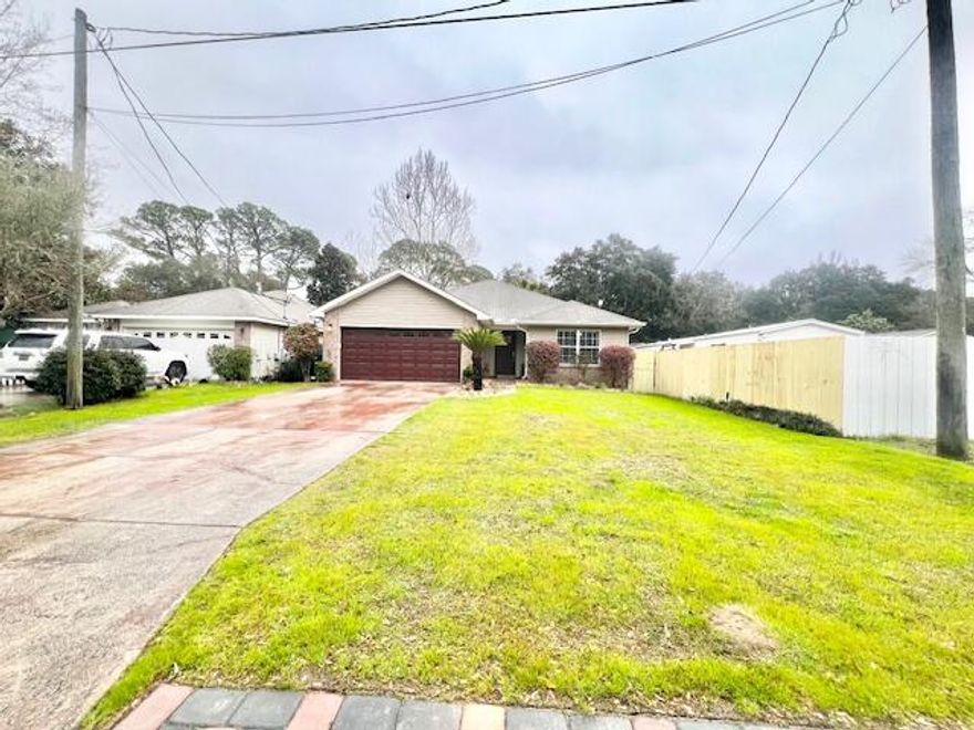 Welcome to this charming 3 bedroom, 2 bathroom home located in the desirable area of Niceville, FL. This house features a spacious living room with a cozy fireplace, cherry look flooring throughout, and a kitchen with plenty of dark cabinets, granite countertops, stainless steel appliances, and a convenient breakfast bar. The comfortable sized bedrooms offer plenty of space for relaxation, with the primary bedroom boasting an en-suite bathroom and walk-in closet. Step outside to the covered patio and fully fenced yard, perfect for outdoor entertaining or simply enjoying the fresh air. Don't miss out on this wonderful opportunity to make this house your new home!**Carpet cleaning & Admin Fee charged (if applicable)