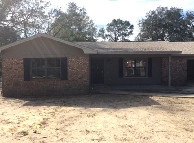 Absolutely incredible home, which sits on .36 acres, within walking distance to both Niceville HS and Ruckel Middle School has been completely remodeled and will ready to move in within two weeks. Upgrades include: Seller has removed a couple of walls to open up the floor plan. ALL NEW - Hardwood Floors, Cabinets, A/C, Sprinkler System, Stone Faced Fireplace, Sod, New Light Fixtures, Hardiboard Siding, Carpeted Bedrooms, Vanities in both bathrooms, Interior and Exterior Paint, Shutters, Bathtubs, Tiled Showers and a Privacy Fence. Seller is also providing a Termite Bond. Roof is four years old. Seller has also removed the popcorn texture from the ceilings. The large yard has mature trees and a large storage shed with new hardiboard siding. This home is a must see!!