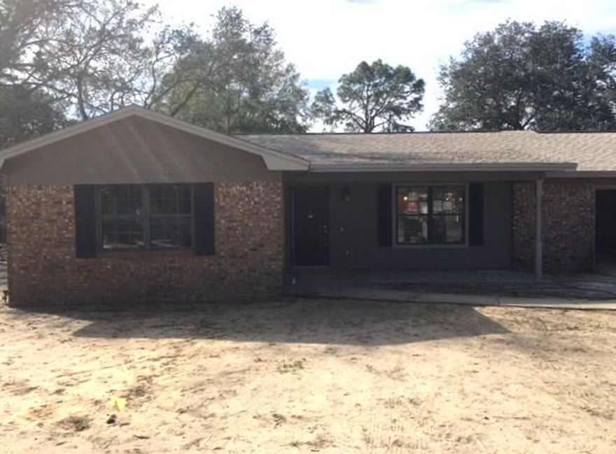 Absolutely incredible home, which sits on .36 acres, within walking distance to both Niceville HS and Ruckel Middle School has been completely remodeled and will ready to move in within two weeks. Upgrades include: Seller has removed a couple of walls to open up the floor plan. ALL NEW - Hardwood Floors, Cabinets, A/C, Sprinkler System, Stone Faced Fireplace, Sod, New Light Fixtures, Hardiboard Siding, Carpeted Bedrooms, Vanities in both bathrooms, Interior and Exterior Paint, Shutters, Bathtubs, Tiled Showers and a Privacy Fence. Seller is also providing a Termite Bond. Roof is four years old. Seller has also removed the popcorn texture from the ceilings. The large yard has mature trees and a large storage shed with new hardiboard siding. This home is a must see!!