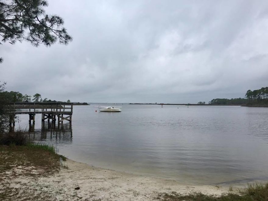 Start living the boating lifestyle you've always dreamed of! Just 3 blocks away from Cessna Park & the public boat launch, you can launch your boat and be in the water in no time! If you prefer beach, the white sand & crystal blue waters of the Gulf of Mexico are just 4 miles away. Located in the heart of Santa Rosa Beach, Gulf Place on 30A with its art galleries, events & wonderful restaurants is close by. With NO HOA & NO build out time, there's no rush, so you can enjoy the lot's location before you decide to build. The adjacent lot is also for sale and BOTH parcels can be purchased for $75,000.