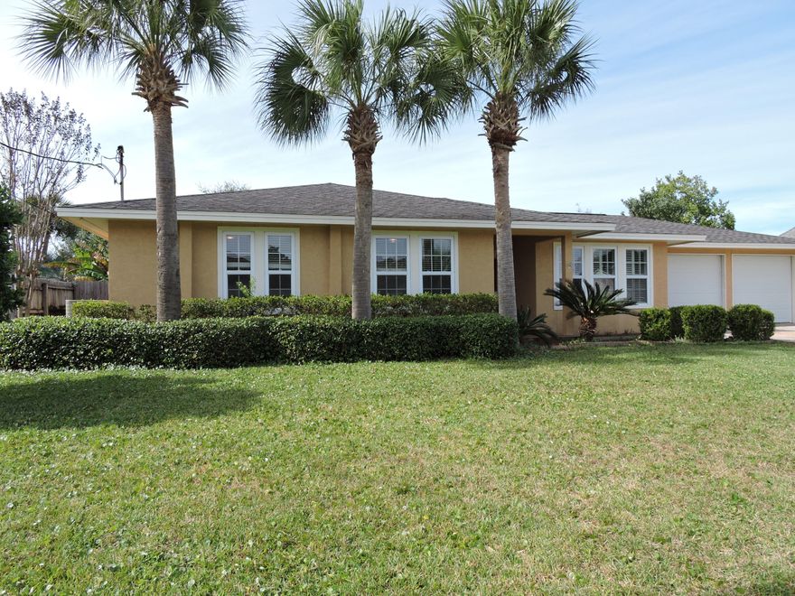 Beautifully renovated home w/great yard! Just around the corner are Destin schools and tons of shopping. Gorgeous home w/3 bedrooms PLUS office. No Carpet - tile, laminate hardwood flooring, & travertine! Kitchen totally renovated in 2009 w/new shaker style cabinetry, granite counters & SS appliances. Family room is spacious & open to kitchen. Master bed has a walk-in closet plus another closet, fully renovated master bath w/large travertine tile shower, granite vanity, & travertine tile flooring. 2nd & 3rd bedrooms are a nice size too. 2nd bath is also updated. Back yard is low maintenance w/ well/irrigation system & lots of room for entertaining- plus a great covered patio! Home warranty in place. Newer roof/windows/HVAC!