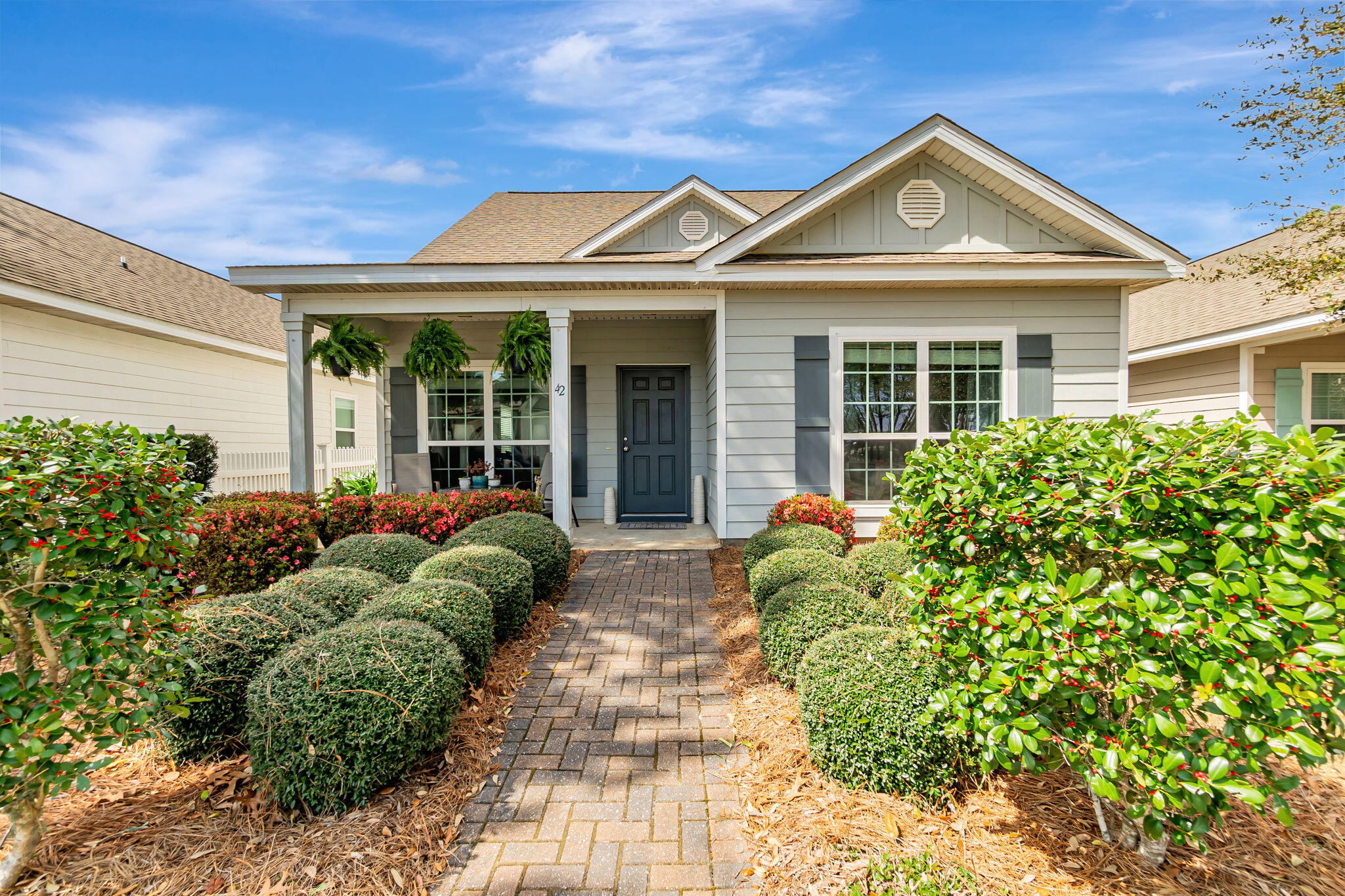 Welcome to this four-bedroom, three full bathrooms home currently in the highly sought - after Hammock Bay community! FHA assumption for qualified buyer with a 2.875% rate. This home offers an open-concept layout perfect for entertaining, with LVP flooring throughout the main floor and cozy carpeted bedrooms. The primary suite and an additional bedroom with a full bath are conveniently located on the main level, while two more bedrooms and a third full bath are upstairs. A two-car garage provides plenty of storage.But what truly sets this home apart is its prime location, located near everything Hammock Bay has to offer! Enjoy being near it all, Props Brewery, the Town Green  for the farmers market and weekend events, and easy access to top-notch amenities, including: resort-style community pool, gym, basketball,
tennis & pickleball courts, the community center & theater, playground & sports complex, as well as the canine park & general store. 
With full landscaping maintenance included, you can spend less time on yard work and more time living the Hammock Bay lifestyle! Plus, you're just 25 minutes from the breathtaking 30A beaches.