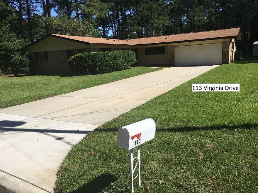 All brick four bedroom, two bathroom home with many extras you need to see to appreciate. New carpet in living/dining room, solid surface parquet floors in all bedrooms and tile in the spacious kitchen/breakfast room. New kitchen appliances include double door refrigerator with lower freezer. Insulated and air conditioned garage. Home security system with full exterior video. Sliding glass doors onto patio have a roll down blind for hurricane and security protection. Home backs to the city walking area - peaceful and quiet with plenty of room on this .55 acre lot. The 12x20 shed can handle all your storage or hobby needs. Be sure to read the sellers disclosure under documents for list of upgrades. Don't wait - at this price and with low interest rates, make an appointment today.