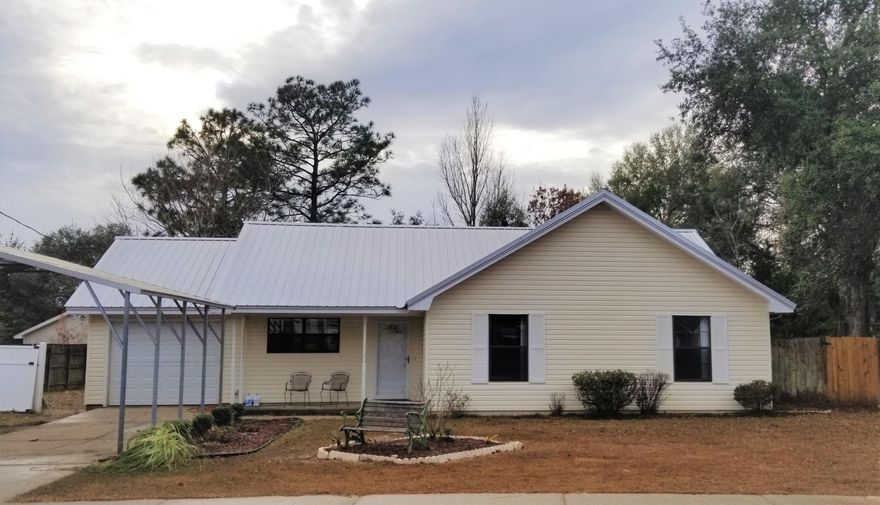 Don't let the square footage fool you, this spacious, open floor plan has room to move!The kitchen has been updated with top-notch stainless appliances, including a built in microwave, smooth top stove with convection oven, refrigerator with ice-maker, and a Bosch dishwasher. With tile throughout, there's no need to worry if you bring your fur babies too. Recent upgrades include a metal roof, appliances, AC unit, and covered area perfect for parking your boat or RV. A LARGE, FLAT, PRIVACY FENCED backyard is hard to find on the southend! Measurements approximate. Buyer to verify any information deemed important. Call for a showing today!