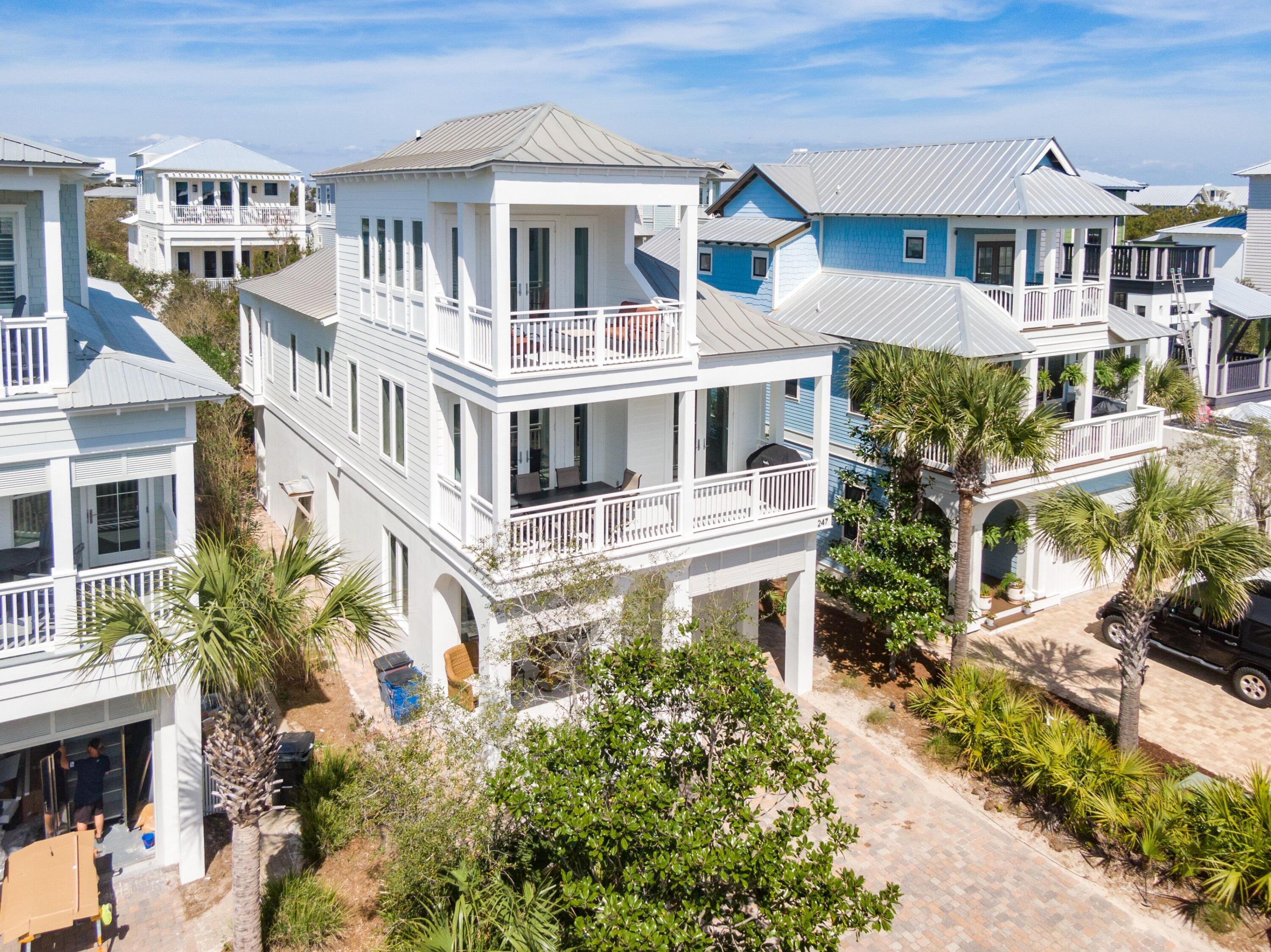 Located 30 seconds from the private beach and pool for Barbery Coast owners & guests only, 247 Winston Lane is on the west end of Inlet Beach, as close as you can possibly be to Rosemary. Featuring massive gulf views, the top-floor suite is a private, luxurious experience, constantly reminding you of why these waters capture the heart of so many. The property holds rare amenities for a beach home such as a single car garage, a well-stocked kitchen equipped with a gas range and wine cooler, as well as plenty of parking out front. The open second floor gathering space is designed exquisitely. The lengthy balconies are perfect for letting in the salt air with the gas grill and dining area right off the kitchen perfect for the family's most cherished holidays.