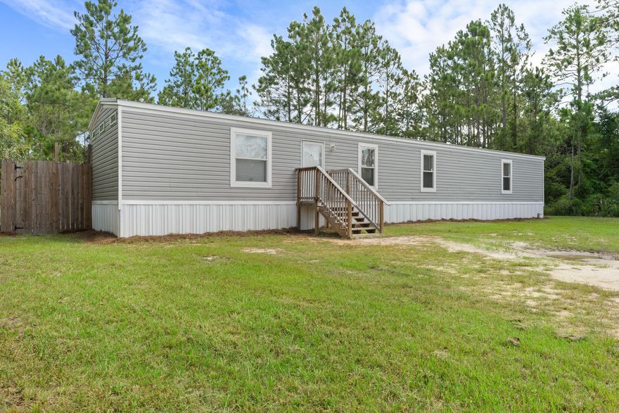 Have You Been Looking For An Affordable Home In The Highly Sought After Santa Rosa Beach? Look No Further!! This Adorable 3BR/2BA Residence Is Situated On 0.55 Acres With No HOA! The Coastal Theme Home Was Built in 2019 & Features An Open Concept Living Room & Kitchen, Split Floor Plan, Built In Entertainment Center, Breakfast Bar, Recessed Lighting, Stainless Steel Appliances, Farm Sink, Oversized Main Shower & So Much More. Conveniently Nestled On A Spacious Lot That Is Within A Short Distance To The Bay. Located Just Mins Away From The Finest Dining, Shopping & Entertainment That SoWal & 30A Has To Offer. Don't Miss The Opportunity To Make This One Yours...Call Today To Arrange Your Private Viewing!