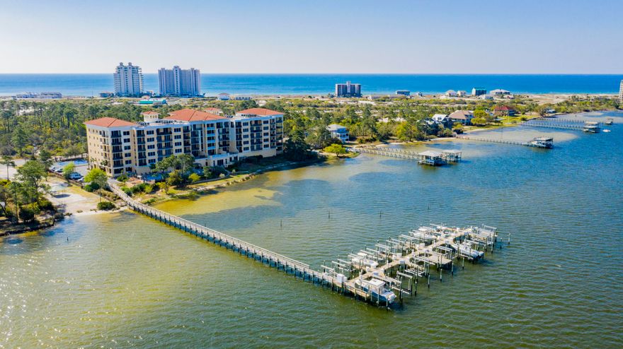 Discover a true gem with this expansive & rare floorplan at the highly sought-after La Serena. This stunning 3-bedroom, 3.5-bath waterfront residence boasts a far-stretching balcony offering breathtaking views of the serene Intracoastal waters, creating the perfect backdrop for Gulf Coast living. Step inside & be captivated by the luxurious coastal ambiance, complete with high-end furnishings & thoughtful design that makes you feel right at home. The open living space features beautiful luxury vinyl & tile floors, granite countertops, stainless steel appliances, designer lighting, crown molding, & soaring 10-ft tray ceilings. Each bedroom offers a tranquil retreat, with new mattresses in each of the three bedrooms, including a Tempur-Pedic in the primary suite. The primary bedroom is a sa