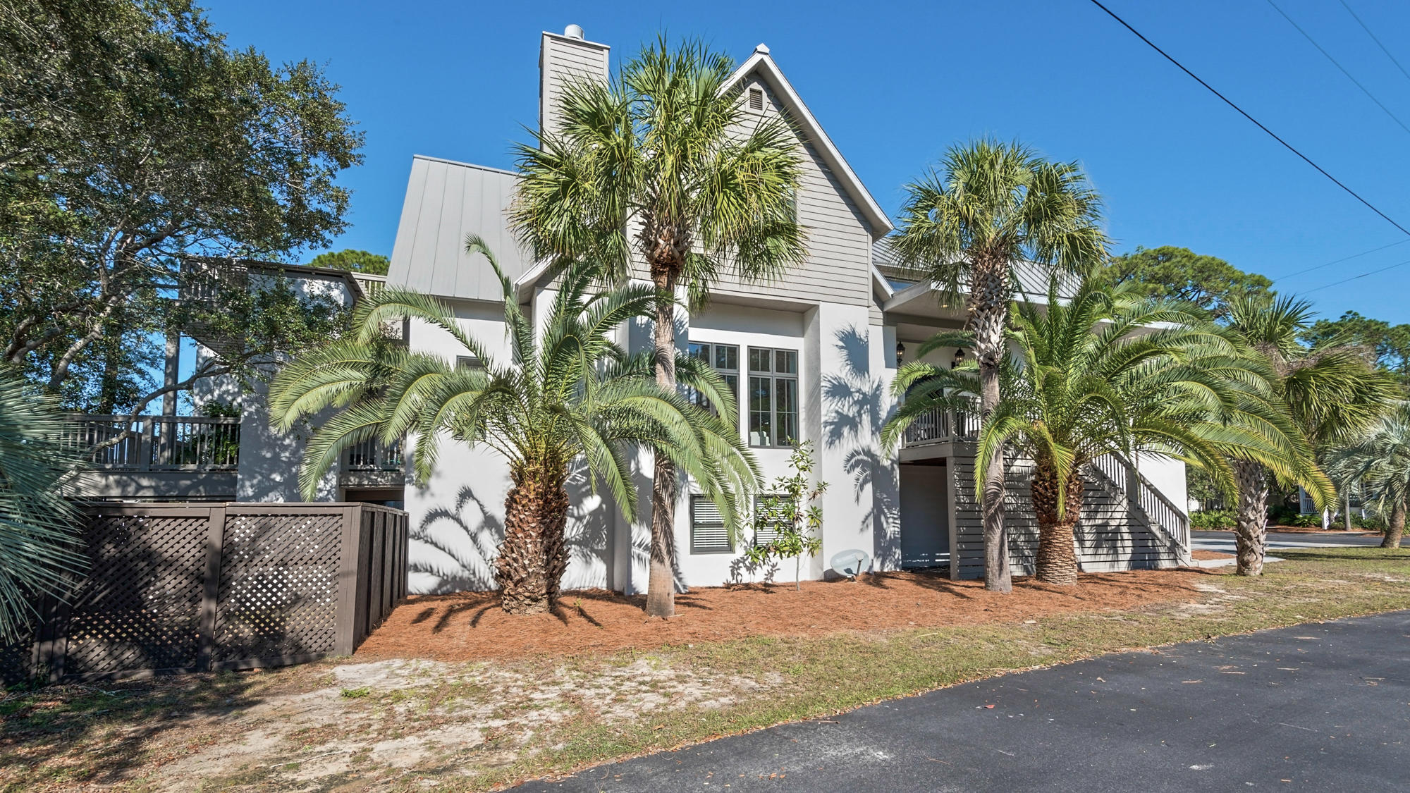 South of 30A, on Eastern Lake, one of Florida's rare coastal dune lakes, this home has a private heated pool and dock from which you can kayak or paddle board straight to the Gulf of Mexico and beautiful beach! Inside, you will find a spacious living rm w/ fireplace, open kitchen, powder rm and 2 large bedrooms w/ private baths on the main floor. The 3rd floor offers a huge master suite w/ large private deck and additional lg bdrm w/ private bath. The 1st floor has a large rec room, kitchen and bunk rm w/ access to pool, dock, 2 car garage and workshop/office. Could also be a lockout private apartment or MIL suite. Each floor also has its own laundry rm. One of the sellers is a FL. Lic Real Estate Agent.