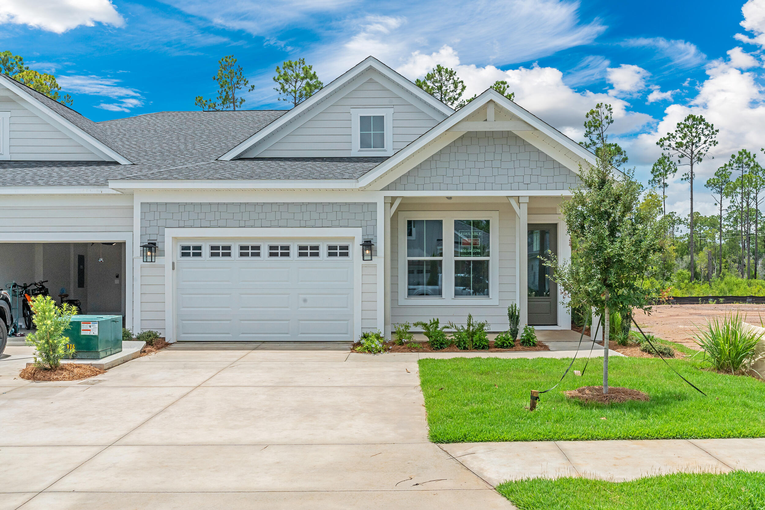 Welcome to The Villas at Longleaf Park in the Watersound Origins community, offering stylish paired/attached villas by Fischer Homes. This newly finished LUCAS plan is a beautifully designed 2-bedroom, 2-bathroom single-level home, featuring 1,418 sq. ft. of effortless living space and a 1.5-car garage.Step inside to an inviting open-concept layout with a modern kitchen, spacious dining area, and a bright living room that seamlessly flows into a private covered patio, perfect for outdoor relaxation. The primary suite overlooks the backyard and boasts a spa-like ensuite bathroom with a double vanity and a generous walk-in closet.This home includes standout features like luxury vinyl plank flooring throughout, 10 ft ceilings, Smart Home White glove service, Luxury Owner's Bath with Barn Door, Upgraded Quartz countertops, cabinets, built-in appliances in Kitchen and more!
See Designer selections (in Documents) chosen for this beautiful home!
Enjoy the ease of a low-maintenance lifestyle, HOA membership covers lawn care and exterior home upkeep, giving you more time to enjoy the exclusive amenities Watersound Origins has to offer such as the Origins Golf Course, a resort-style pool, sports courts, and more.
Make this your new home and embrace easy living in a vibrant, amenity-rich community. Schedule a tour today!