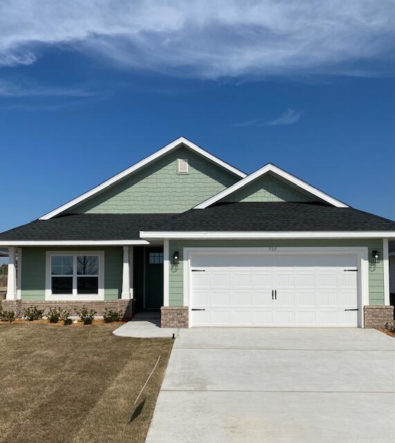 Builder pays the bulk of closing costs with a preferred lender and is also offering up to $15K in flex money on this home.  Popular Craftsman 3 BR/2 BA home with Hardiboard siding and brick skirt.  Quartz countertops, LVP flooring throughout, separate shower and garden tub in Master Bath.  Spacious master bedroom (14x22), 9' ceilings throughout, 8' entry doors, Tray ceiling in master with a large walk in closet.  Generous covered patio. Fully sodded yard with sprinkler system, well + pump, garage opener, attic pull down stairs. Community pool to be built by developer.