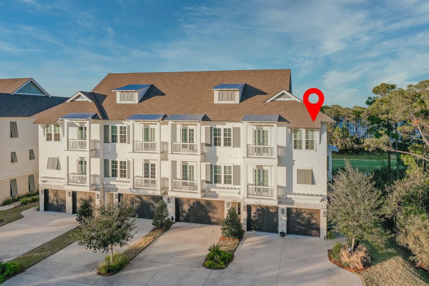 Elegant end unit brownstone with expansive bay views spanning across the 3rd hole of Kelly Plantation's Golf Course. This luxurious 4 bed/3.5 bath townhome is one of the largest in the complex, boasting an elevator, two car garage, private wooded area to one side, and numerous high end finishes. Everyone congregates in the kitchen - enjoy a large, open gourmet kitchen with Wolf and Sub Zero appliances, oversized island, coffee bar, and a sitting area. Custom barnwood tile throughout the home, with a spacious, serene master suite, complete with a large bathroom and walk-in closet, and gorgeous views. Oversized balconies and a fenced in paver area provide a convenient transition to the outdoors to enjoy unobstructed bay and golf course views and the lush landscaping. Kelly Plantation residents enjoy a lifestyle of scenic green spaces and parks along the Choctawhatchee Bay, along with upscale amenities including an award-winning Fred Couples designed championship golf course, private owners club, pool, tennis and pickleball courts, and a dog park.