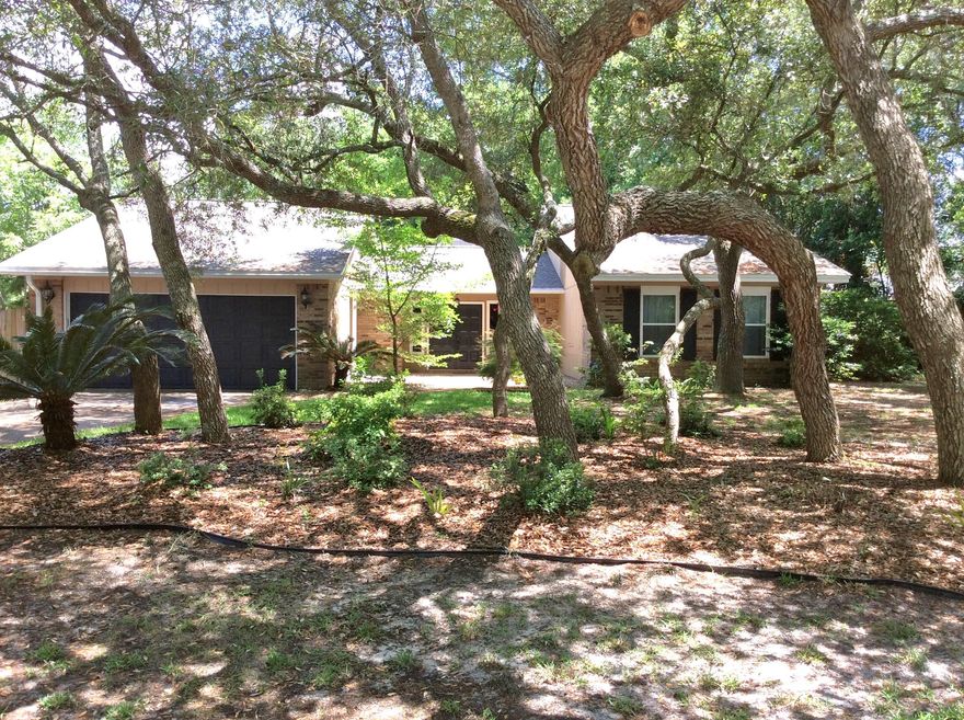 Many updated in this great 3/2 home. Step-down formal living area features a beautiful tiled wood burning fireplace. Raised formal dining area provides excellent entertaining space. Eat-in kitchen with stainless appliances will delight the chef. Home has non-warranted washer & dryer. Off the kitchen is a great Florida room complete with built in pet door. Updated master suite fit for a king & queen. Beautiful shaded backyard with above ground planters just await your summer colors. Owner even provides lawn service! Owner will consider pets with good applications. Any pet must be spayed/neutered and housebroken. $255 pet fee required. Sorry no smoking. Available March 31 or sooner. All persons 18 years or older are required to complete a separate application.