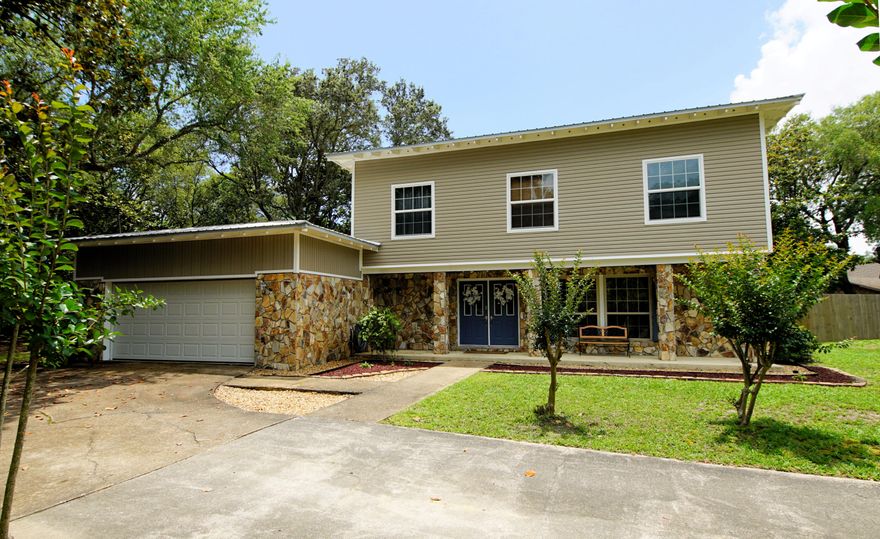 Wonderful location in Poquito Bayou. This lovely 5 bedroom updated sits on a large half acre corner lot with fenced yard and inground pool. Inside there are 2 living spaces, a nicely upgraded kitchen with stainless appliances, legacy cabinets and soft close drawers. There are 4 bedrooms on the second floor to include the large master suite. There is a bedroom and bathroom on the first floor that is currently being used as an office. Outside there is an enclosed porch with fans that overlooks the large back yard and pool. Home has a metal roof that was put on in 2007 and pool pump replaced in 2011. There is a waterfront park on Poquito Rd for easy access for boating/kayaking and paddle boarding.Close to Eglin and Hurlburt AFB, shopping and the beaches.