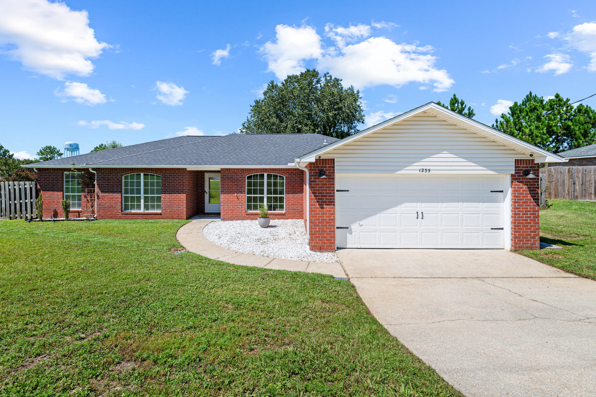 Welcome to 1235 Northview Drive! This home features 4 bedroom, 2 bathrooms, an open formal dining area that can also be used as an office or playroom. As you walk in, you'll appreciate the spacious open concept and split floor plan where the master bedroom is off to one side and 3 additional bedrooms on the other wing of the home. You'll love the wood looking tile throughout the entire home! The kitchen has been nicely updated and features tons of counter space, cabinets, an island, and beautiful granite countertops!The backyard is private and fully fenced in with plenty of room to add a pool if you'd like!There is a VA assumable interest rate. of 2.5% for qualifying buyers.