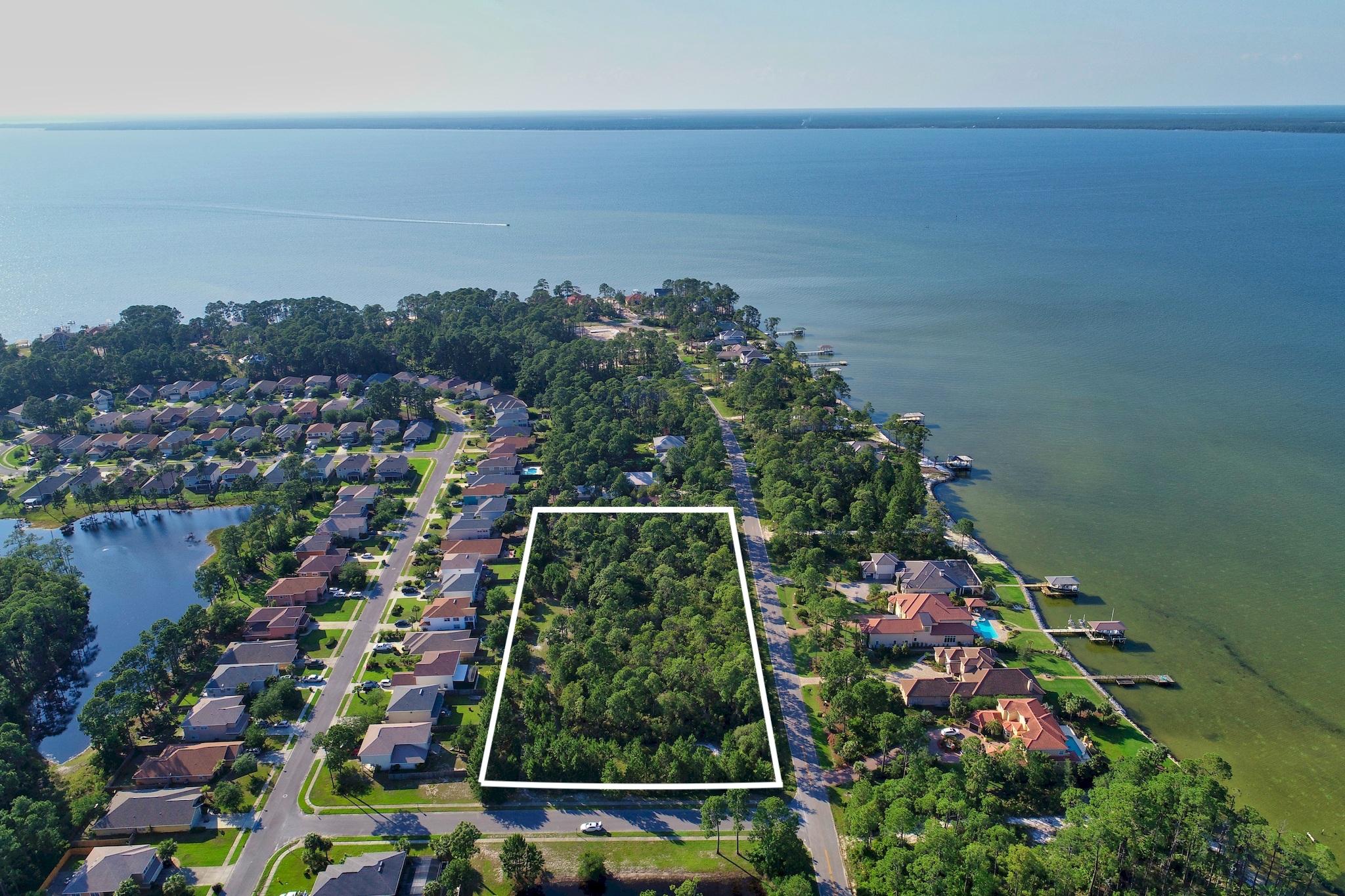 Last opportunity to purchase this property at Driftwood Point as 2.75 acres and for a limited time only. Sellers plan to sub-divide and sell lots individually. At 2.75 acres, developers will appreciate the options available with this large lot, ideally situated for maximum usability. With 500 ft along Driftwood Point Rd and 230 ft along Harbor Mist Ln, this property is ready for building a dream estate or subdividing into multiple home sites. Survey is available. Convenient to Sandestin, 30A, Destin, Panama City Beach, Grand Boulevard, Sacred Heart, and the beautiful beaches of the Emerald Coast. Buyer to verify all dimensions, facts, and assessment fees. Survey available.