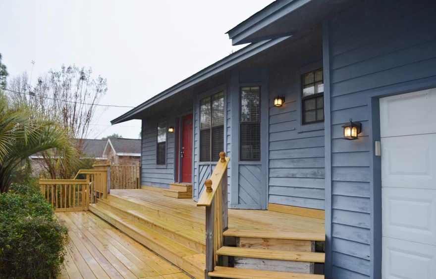 4 bedroom home on the market located in Heart of Destin, under 250k. You don't want to miss out. Split level home features an oversized yard with larger front porch. Living room and Kitchen are located on the main level with two bedrooms below and two bedrooms above. Large garage with workshop counter/cabinets. This home is less than a 1/2 mile from the Joe's Bayou boat ramp.Roof was last replaced in 2004, per the City of Destin. HVAC and water heater are less than 5 years old.