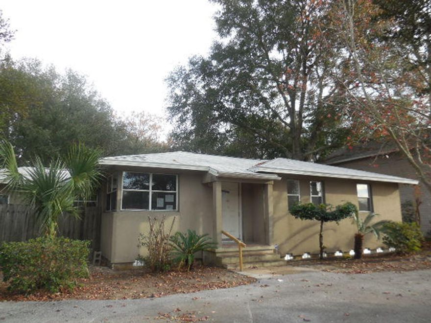 Wonderful renovated home with a brand new roof! The kitchen has new cabinets, new counter tops, and new appliances! The entire home is newly painted! The master features a lovely updated master bath and has a private entrance. There is a formal dining room and roomy living room. The guest bath features a sunken tub. The back yard is large and fully privacy fenced. A circular drive makes parking a breeze.