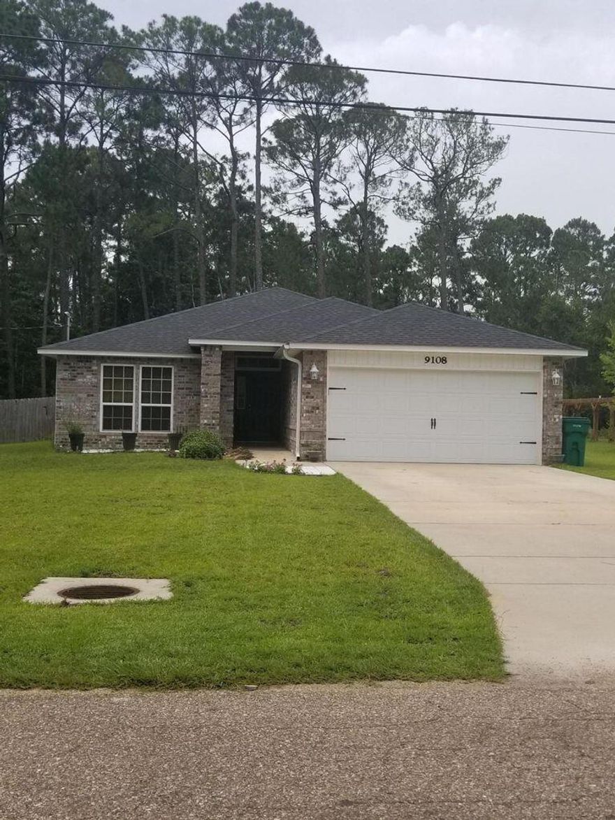 Large 4-bedroom, 2-bathroom home with a two-car garage is located minutes from Navarre Beach and just west of Hurlburt AFB. The home is located on a half-acre lot with a large, fenced in backyard. The home has an indoor laundry room off the 2 car garage, tiled back splash, built in buffet and center island with power and granite counter tops in the kitchen. The master bathroom features a double vanity, huge walk-in closet. Pets approved on a case-by-case basis with $250 pet fee per pet.