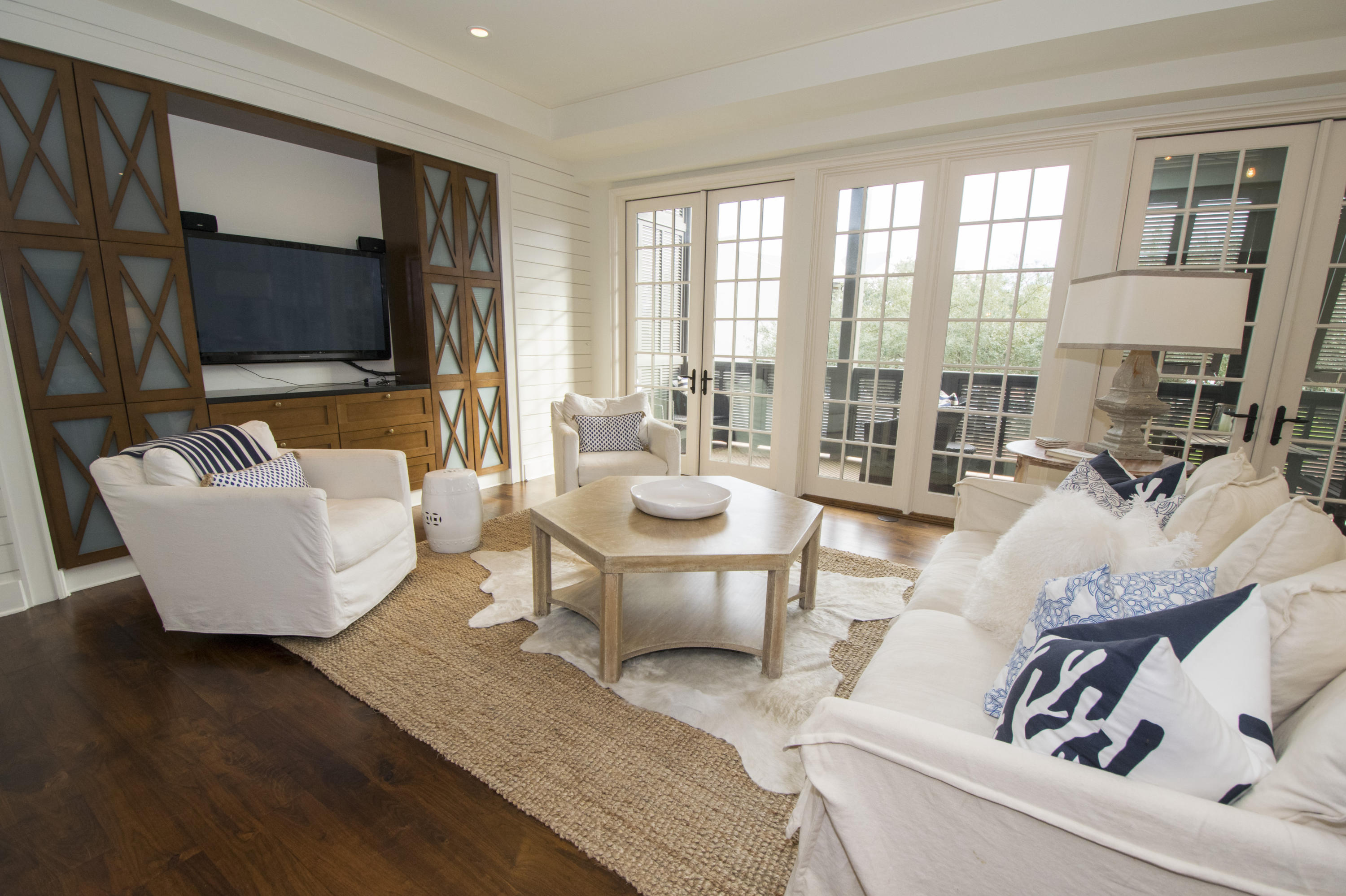 Elegant, one of a kind condominium in coveted Rosemary Beach. Professionally decorated and offered fully furnished, this condo is listed as a 2 bedroom but has a large bonus room, situated behind a sliding barn door with exposed hardware, currently outfitted as a queen bedroom. The master bedroom features an en-suite bath with double vanities and a generously sized walk-in closet. With incredible views from your huge, private balconies, Viking appliances and walnut hardwood floors, you and your guests will be impressed.Barrett Place is Rosemary's newest building with an underground parking garage, restricted elevator access to the residential floors, owner storage cages in the garage and geothermal heating & cooling.