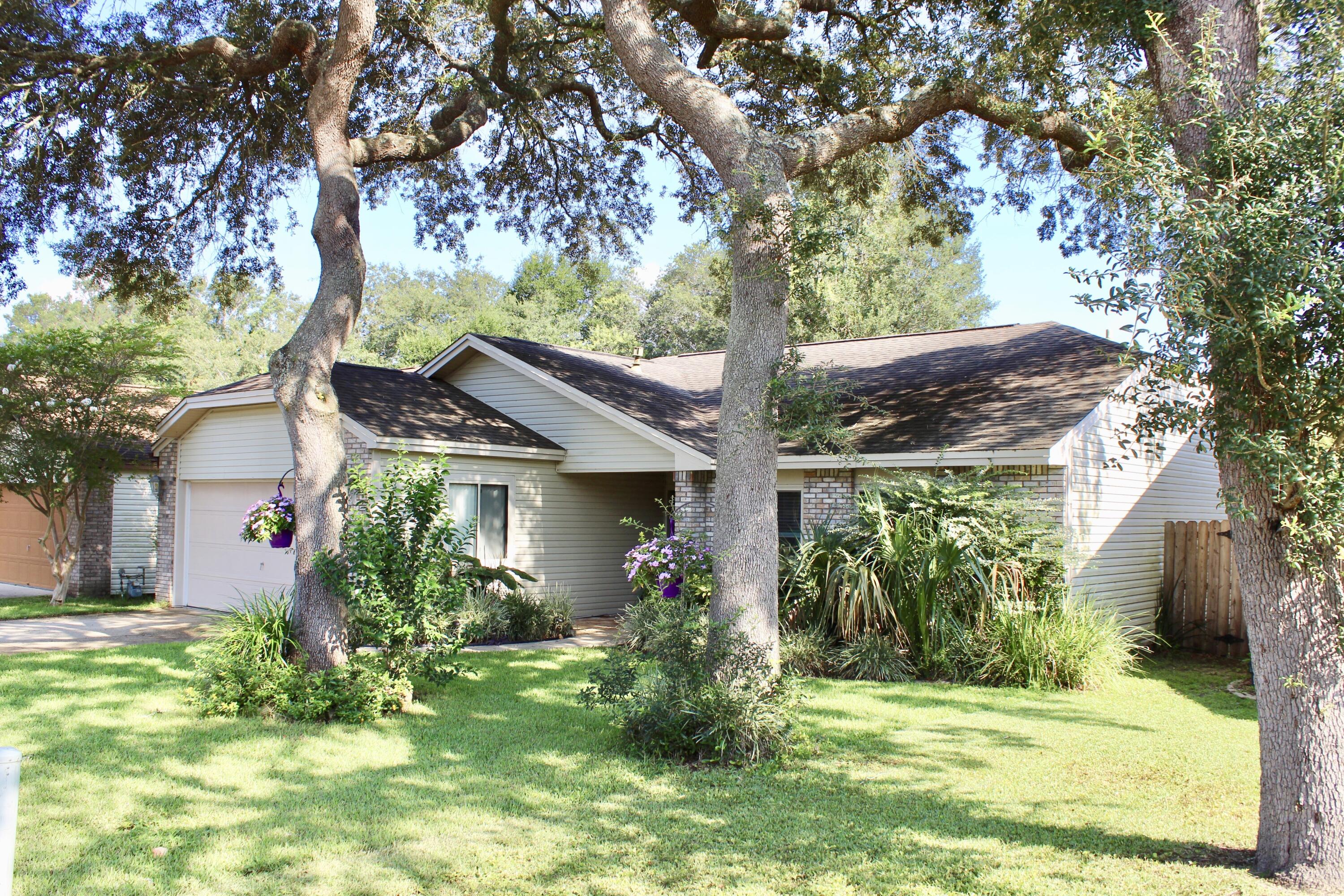 Beautiful home in Niceville with 3 bedrooms, 2 full baths and 1274 sqft. This home has been taken care of and it shows as soon as you walk through the door. It has great curb appeal. The kitchen has granite counter tops and is open to the dining room with a built in desk & tiled screened porch make this the home you have been searching for in Niceville! You will love the SS appliances in the kitchen has glass tile backsplash, recessed/under cabinet lighting. In a private cul-de-sac AND NO HOA! The above ground pool makes your fully fenced backyard a Florida oasis while the screened porch provides shaded outdoor living space.