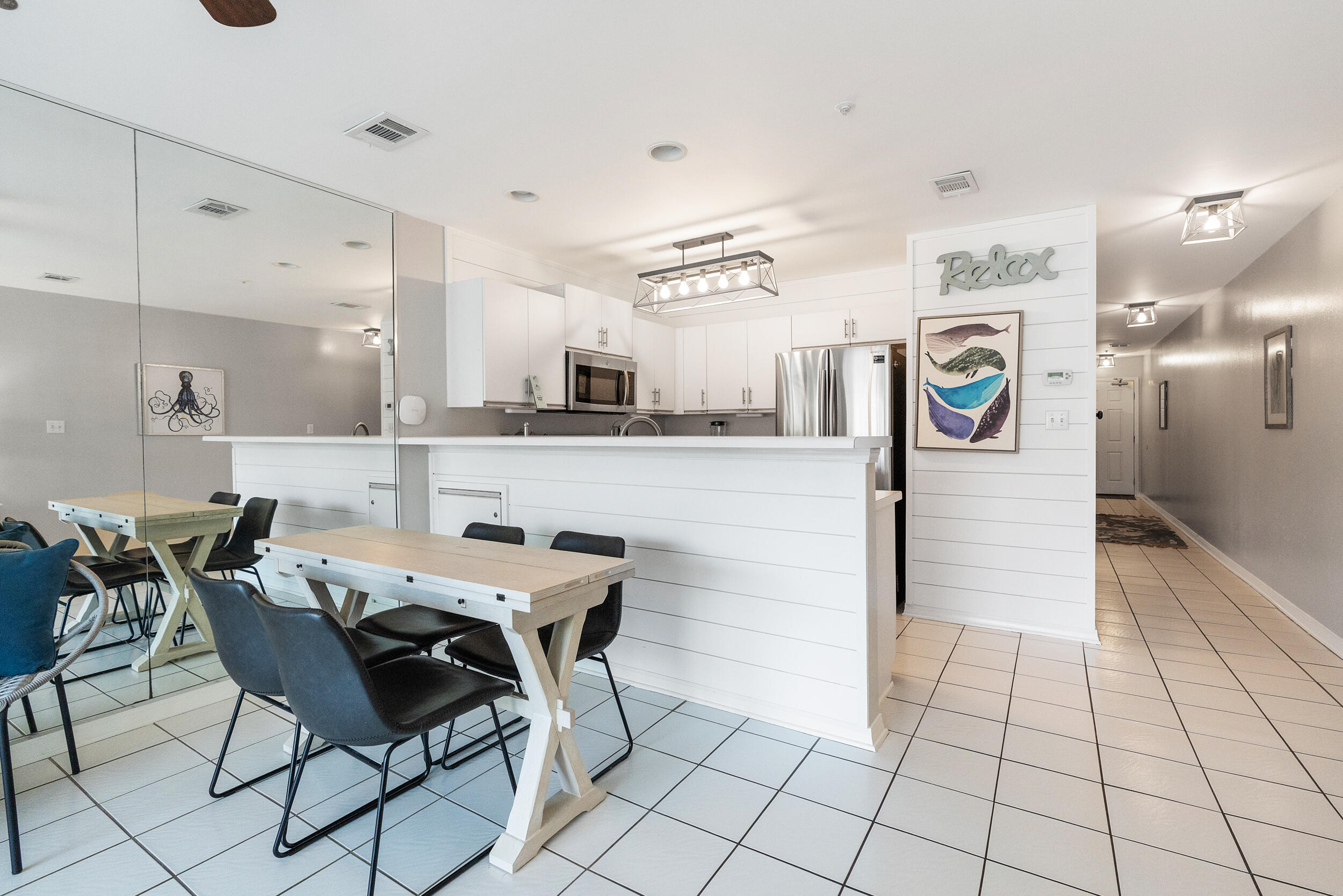 Enjoy coastal charm in this beautifully decorated 1 bed, 1.5 bath condo at Maravilla! This second-floor unit features stylish shiplap accents in the kitchen, stainless steel appliances, and a peekaboo view of the Gulf from your private balcony. Just steps from Maravilla's private beach with a NEW beach ramp, two swimming pools (one seasonally heated), hot tub, fitness center, tennis and pickleball courts, and clubhouse. A prime location on Scenic Gulf Drive puts you close to everything in Destin while offering the serenity of a gated beachfront community. This resort is PET FRIENDLY for both owners and guests which is a GREAT PLUS! Ideal as a vacation retreat or investment rental! Both SIRS and Milestone has been completed!