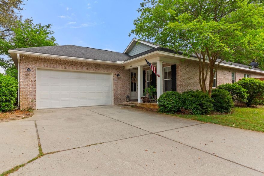 Charming All-Brick Craftsman Style Home in the Heart of Niceville with Designer Touches and Timeless Appeal.Nestled beneath ancient oak trees in the heart of Niceville, this beautifully crafted, low-maintenance all-brick home offers comfort, elegance, and charm in equal measure. From the moment you arrive, the herringbone brick front porch with real wood shutters invites you into a space that feels both classic and fresh.Step inside to an airy, open floorplan featuring gleaming hardwood and tile floors throughout--absolutely no carpet! The gourmet kitchen is a showstopper, complete with granite countertops, stainless steel appliances, a stylish breakfast bar with pendant lighting overlooking the spacious living area, a super cool coffee bar, and a generously sized pantry. Its a space designed for both daily life and effortless entertaining.

The dreamy primary suite offers a peaceful retreat with a spacious walk-in closet and a luxurious en-suite bath featuring double vanities and a custom walk-in shower. Every detail is elevated by thoughtful finishessmooth ceilings with recessed lighting, elegant crown molding, finely crafted wood-trimmed windows and doors, and soaring 9' ceilings with grand 8' doors that elevate every room with sophistication.

Outdoors, enjoy the privacy of your fenced backyard while relaxing on the screened-in back porchperfect for morning coffee or evening gatherings. A gated entrance from Sycamore Street offers easy side access to the yard. Towering oak trees provide natural beauty and even the perfect spot to hang a tire swing. The oversized double garage gives you plenty of space for vehicles, tools, or weekend toys, and there's a dedicated laundry room, too.

This home truly has it all: location, design, comfort, and character. Don't miss your chance to fall in love with every detail. Call your Realtor TODAY!

