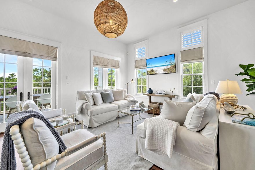 Looking for a fully furnished home with GULF VIEWS that backs up to nature? This is it! This stunning, fully remodeled 5-bedroom, 5-bathroom home is located on the quiet west end of 30A, backing up to the untouched Topsail Hill State Park and Preserve. Offering a rare combination of Gulf views and privacy, this thoughtfully designed 3-story retreat blends coastal style, comfort, and functionality.The first floor features two spacious bedrooms, including a guest master suite with soaking tub and double vanity. The second bedroom also has its own full bath with a large shower. A laundry room, linen closet, and access to a covered patio and fenced backyard complete the level. The 2-car garage and long driveway provide room for vehicles and a golf cart. On the second floor, enjoy preserve views from the open-concept living, dining, and kitchen area. The updated kitchen is fully equipped for family meals and gatherings around the large round dining table. The living space opens to a balcony with grill and views of nature and wildlife. Two additional bedrooms with en suite baths and a front balcony provide more space for guests and relaxing.

The entire third floor is a private master suite featuring sweeping Gulf views, a large walk-in closet, spa-style bathroom with soaking tub, dual vanities, and space for an office or sitting area. French doors lead to a private balcony overlooking the Gulf and preserve, perfect for sunset watching.

Located in gated Cypress Dunes, community amenities include:

Two resort-style pools (one with Gulf views)

Luxury clubhouse with chef's kitchen & TV

Fitness center, tennis & pickleball courts

Outdoor fireplace, green spaces, walking trails, and scenic boardwalks

Move-in ready and beautifully furnished, this coastal gem offers the ultimate blend of luxury, nature, and Gulf viewsperfect as a full-time home or vacation retreat.

**Included in the sale is 50% ownership of the lot in front of this home. LOT-74


