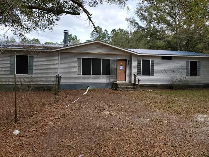 Quiet setting in the heart of growing Freeport. This 1 acre lot is located at the end of a dead end street. You have plenty of space to park all of your toys, boats, RVs, etc. You are 20 minutes away from the white Beaches of South Walton & the Gulf of Mexico. You are less then 5 minutes to many public boat ramps for a day of fishing. The mobile home needs a lot of work, the value is in the location and land.Buyer to verify anything deemed important including, but not limited to zoning, lot size, room dimensions, sq/ft, etc...