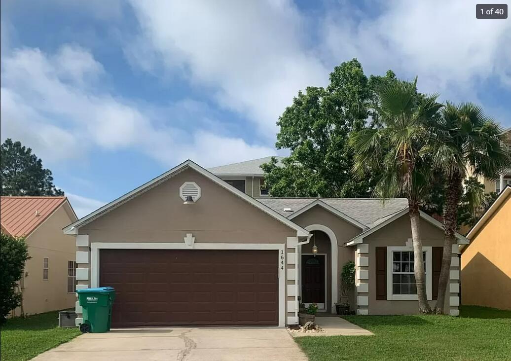 Welcome to 1644 Vecuna Circle! Located in the heart of Panama City Beach, this 2 bedroom 2 bathroom home is conveniently situated within a short drive to anything you could need. Shopping, grocery, schools, entertainment and so much more all within a 5-10 drive in any direction. This home features 1,286 Sq Ft of heated/cooled living space, a 2 car attached garage and over 300 Sq Ft of covered porch entertainment space in the back!! Additionally this home has a new 2023 HVAC system and updated tile floors throughout. This area is also zoned for SHORT TERM rental for anyone looking to expand their portfolio
