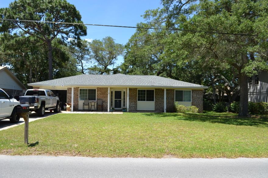 Open floor plan with three bedrooms and two bathrooms located in the center of Niceville.  Home also has a bonus room that can be used as an office.  Completely updated interior in 2014 to include appliances, flooring, windows.  New roof April 2021 & A/C replaced in 2020.  Located within minutes of shopping, schools, community center, and short commute to Eglin.