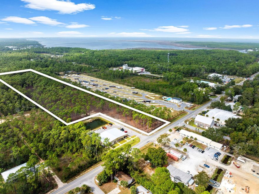 Unlock the potential of this high-visibility property along the rapidly developing corridor of N County Highway 393 in Santa Rosa Beach, FL. Offered per acre with a minimum purchase of 2.5 acres or up to 8.75 acres when combined with the adjacent parcel.Positioned between US-98 and Scenic Highway 30A, the site is surrounded by light industrial parks and commercial growth, offering a strategic location for future development. The zoning is Neighborhood Infill (NI), which can support a variety of uses, including single-family homes, light industrial, live/work setups, multifamily, and short-term rentals (Airbnb/STR). Buyers are responsible for verifying allowable uses with Walton County Planning and Development. This is a flexible development opportunity in one of Santa Rosa Beach's most rapidly expanding corridors. Contact us today for pricing, survey details, or to discuss acreage configurations that best suit your vision. Please note: The existing warehouse on-site is not included in the sale. Seller financing available on a case by case basis.