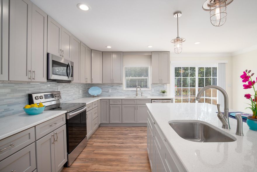 ~NEW~NEW~NEW!!! This Home has been COMPLETELY Remodeled from Top to Bottom. Features include: New Wiring / New Plumbing / New HVAC / New Stainless Steel Appliances / New Metal Roof / New Hot Water Heater / New Hardi-Plank Siding / Granite Counters / Custom Kitchen Cabinets with Soft Close Drawers / Custom Tiled Shower and Tub Surround / New Lighting / New Flooring / New Doors / New Baseboards.  Other Features include: Open Floor Plan  / Large Living and Dining areas / 8 x 12 Shed /  Huge Decks in Front and off the Kitchen in the Back / New Circular Driveway. There is a Boat Ramp Less than One Mile away. Home Sits on .62 Acre with Mature Live Oaks and a Magnolia tree.  Enjoy Country Living only Minutes from the BEACH! Buyer to verify all Dimensions and information.