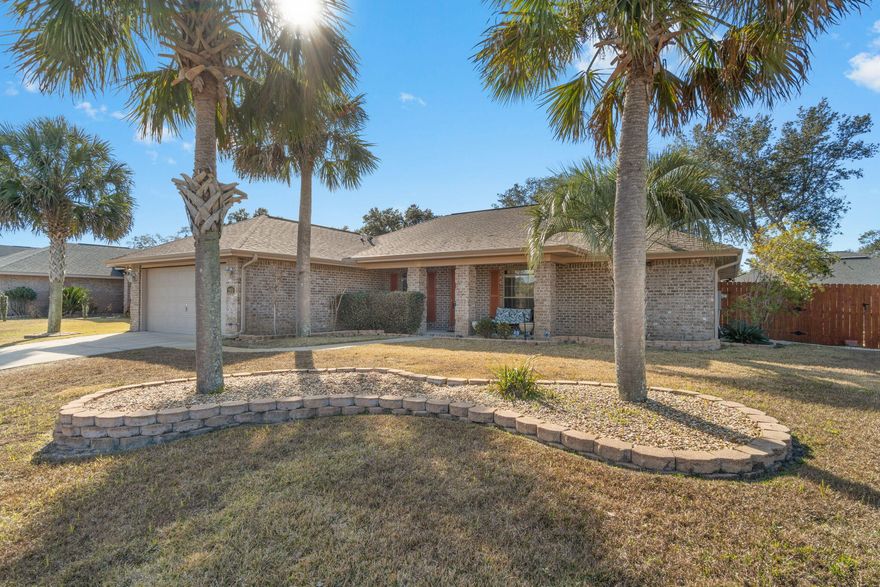 Simply Said....Welcome Home ~If you're looking for move in ready ~Here it is, exquisite inside and out ~this wonderful family home offers a sought-after location just a short drive from the beach, local stores, schools & Hurlburt Field AFB. Great family living space ~your 3 bed/2 bath home is fully fenced with a great West facing back yard ~ large screened in patio area ~ perfect outdoor living space to entertain or just enjoy those wonderful Florida evenings. Home is located on a no through road offering pleasing curb appeal with manicured landscaping and a welcoming covered front porch. Entering the home, you will appreciate the beautiful  wood look flooring and the open flow to the family room with vaulted ceiling and focal point fireplace. Kitchen has wrap around breakfast bar, lots of cabinet & countertop space, pantry ,S/S appliances and offers access through to the family dining room. Cozy breakfast nook for your "on the go days "overlooks the back garden and screen porch. Master bedroom has lots of space with open flow to the master bath offering a step-in soaking tub~ separate shower~ private WC and his and hers vanities & two walk in closets. Additional bedrooms are a good size and share the 2nd bathroom with vanity sink and step in tub/shower. All this and the home still offers an entry foyer with access to the light and bright den/office room. Indoor laundry has lots of shelving and space for that additional fridge and leads out to the double garage.
Yard is fully fenced with double gates for great access.

Call today to view your little piece of paradise.
