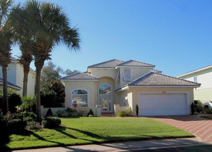 Location...Location...Location...Conveniently located less than 2 blocks from the beach in the premier gated community of Destiny West. Just off Scenic HWY 98 & right between Crystal Beach & Miramar Beach! This custom built home  would be perfect for primary residence or a great vacation rental! This Mediterranean style home features an impressive court yard entrance, an open floor plan with soaring ceilings, crown molding, recessed lighting, gas fireplace & hurricane shutters. The master bedroom is on the 1st floor & boasts of a large master bath, walk in closet, double vanities & under cabinet lighting. There are two additional bedrooms & full bathroom upstairs & a loft has been turned into a 4th bedroom!  A Large Office/Workshop is in the garage!  Buyer to verify all dimensions.