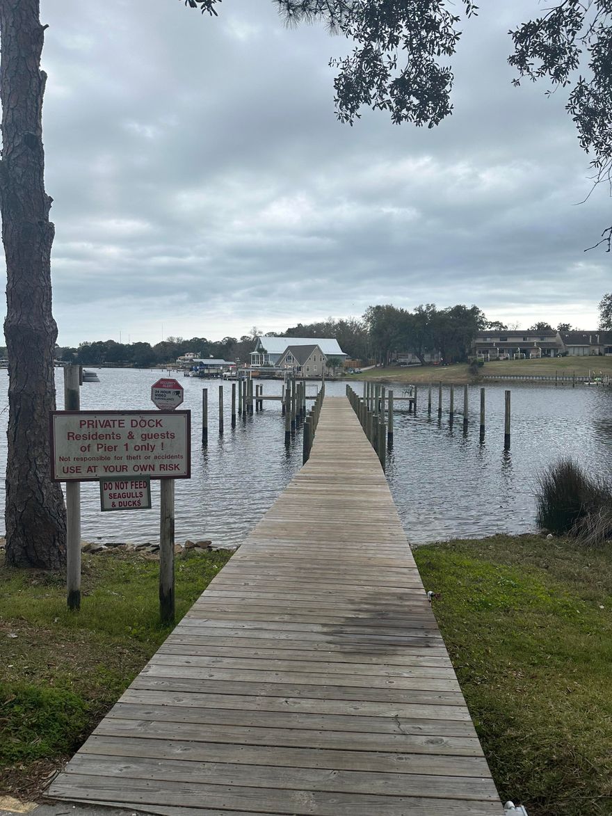 An amazing opportunity to own a waterfront condo with deep water access on Cinco Bayou for less than $100,000. Bring your boat because the recently improved boat dock has several slips that only residents are allowed to enjoy. The community pool has also had recent upgrades and located right next to the dock so if you've had enough of the saltwater then you can watch the dolphins as they cruise in around sunset while you relax by the pool. The unit is nearing completion with just the drywall needing to be hung and finished but the buyer will have the freedom and responsibility of adding the flooring, kitchen, bathroom, and ofcourse the perfect paint for the space. Unit will be like new both inside and out because the entire complex is getting a facelift with fresh new color paint.