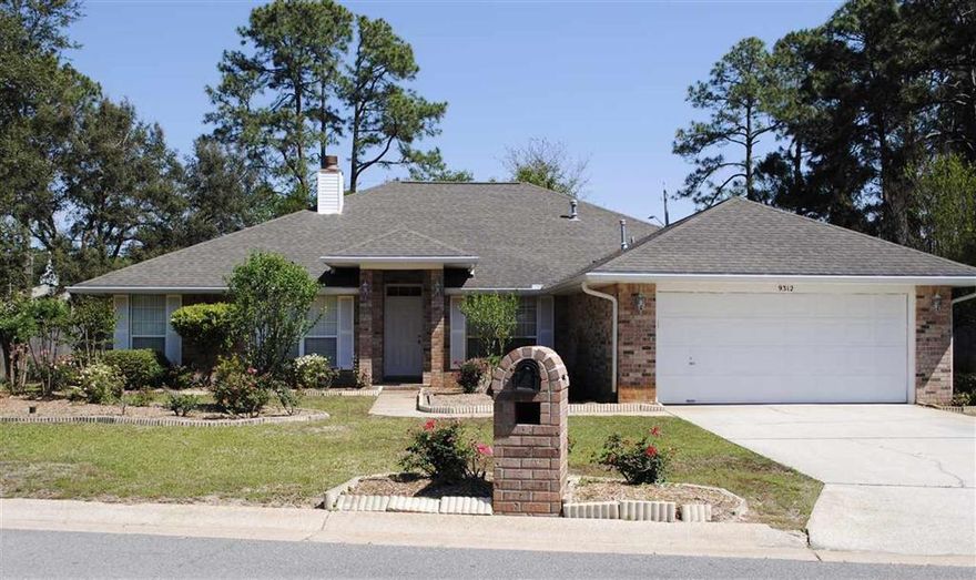 Beautiful, spacious brick home in a gorgeous neighborhood! Seconds from Walmart, close to Navarre Beach and Hurlbert Field! Lots of room, inside and out! The floor plan includes 4 bedrooms AND an office, with the master bedroom on the opposite end of the house from the other bedrooms. No carpet here, only tile and bamboo flooring. The living area is open and roomy, with vaulted ceilings and a fireplace. The chef will love all the counter space and kitchen cabinets. A formal dining room as well as plenty of space for a table in the kitchen/living area offer options for entertaining. All bedrooms have ample closet space, including two big walk-in closets in the master suite, both with beautiful bamboo flooring. The yard features a sprinkler system with a well pump, a privacy fence, and a double gate large enough to get all of your "toys" into the big back yard! There is a beautiful, wooded buffer between your home and your neighbor on one side, providing privacy and a place for wildlife to enjoy. The total lot size is .83 of an acre (according the surveyor). Please note the pictures of the lovely private beach you will have access to as a resident of beautiful Biscayne Pointe!