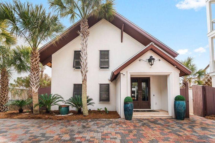 A beautifully reimagined 3-bedroom, 3.5-bath Gulf-front home ideally positioned on approximately .56 acres, extending to the mean high water mark and offering a private beach setting atop a naturally elevated bluff with sweeping Gulf views. Only 50 steps to the beach. Designed for both comfort and coastal elegance, the home features an open-concept living area with a coffered ceiling in the great room and abundant natural light. The chef's kitchen is appointed with Viking professional appliances, a large center island, pantry closet, and seamless flow for entertaining. A charming bunk niche adds flexibility for guests, while a full-sized laundry room enhances everyday functionality. The first floor showcases travertine marble flooring, while the second level features warm hardwood floors. The bathrooms have been fully updated with tile and marble finishes. Ample closet space is thoughtfully incorporated throughout, including generous closets in each bedroom and a large dedicated storage closet.
Outdoor living is equally exceptional. The second-floor deck overlooks the Gulf, providing a stunning vantage point for sunsets and coastal breezes. On the first level, a stone patio offers a gas grill, fire pit, outdoor shower, and private steps leading directly to the beach.
The property is fully enclosed with a concrete perimeter wall and features a gated brick paver driveway, offering both security and a distinguished arrival experience. Zoned Neighborhood Infill and not part of an HOA.