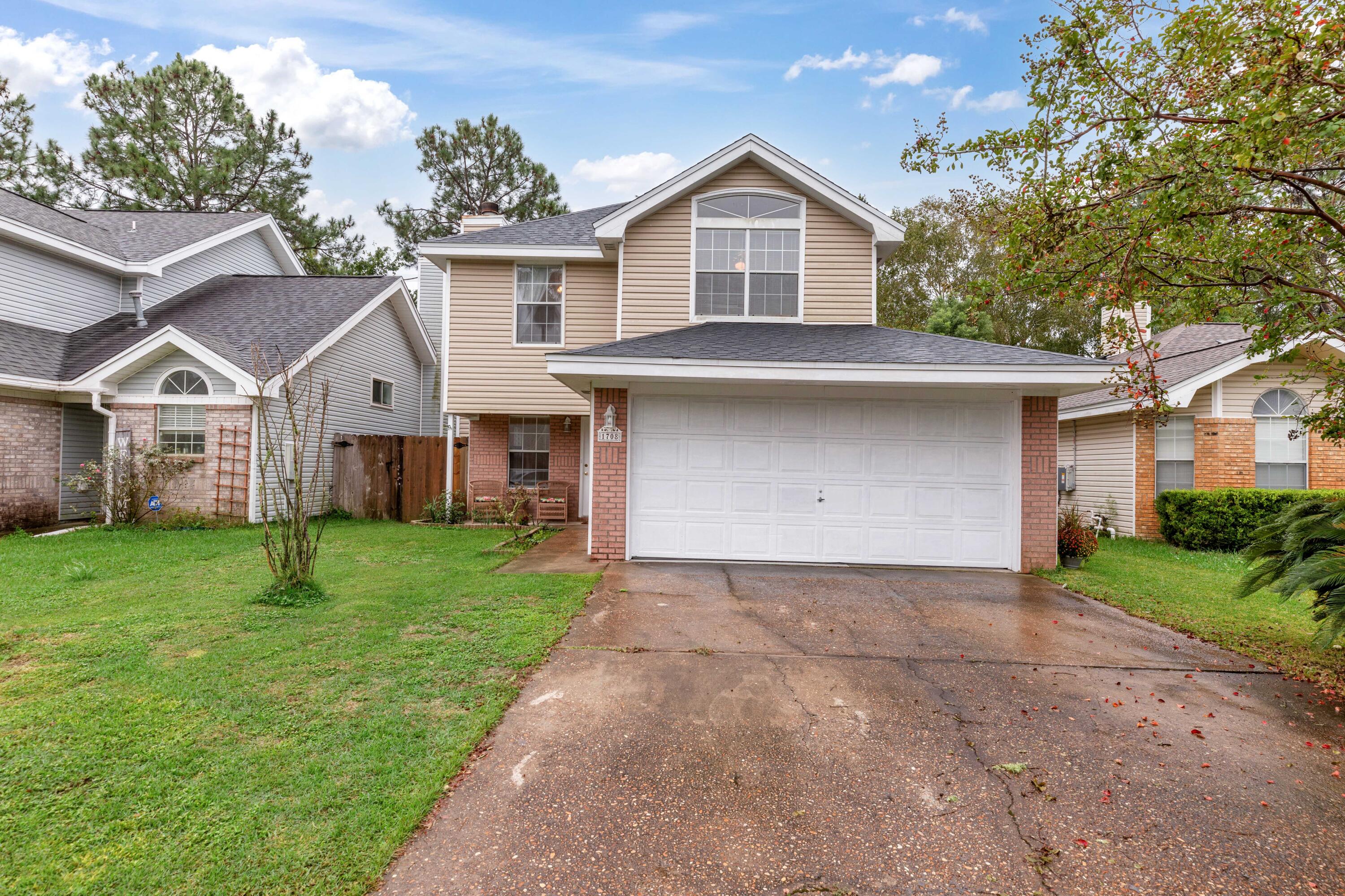 Escape to your peaceful water view yard with this charming single-family home, nestled on an interior lot with no HOA and not in a flood zone. Enjoy serene water views from both the porch and the bedroom window. The partially converted garage offers flexible options--currently providing 1.5 spaces with an office/flex room. The spacious primary bedroom, located upstairs, features an en-suite bathroom with a luxurious jetted soaking tub. This bright and clean home is move-in ready. Pets are welcome with fee. Tenant is responsible for utilities and yard maintenance. $49.00 application fee