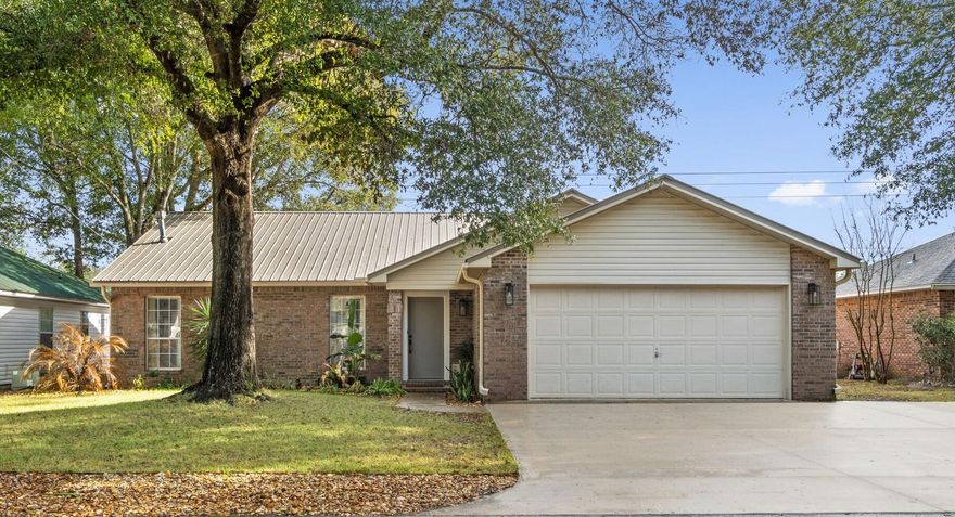 Don't miss out on this stunning 3 bedroom, 2 bathroom home located on a large lot in Pinnacle Point. Nestled south of I-10, in Crestview, this home offers easy access to Eglin AFB, 7th Group, Duke Field, shopping, and schools. Upon entering, you'll be greeted by an open-concept living room, kitchen, and dining area featuring cathedral ceilings, and a cozy fireplace. The heart of the home- the kitchen, boasts stainless-steel appliances and ample cabinetry for storage. The master bedroom is a true retreat, complete with a walk-in closet, and an en-suite bathroom featuring double vanity. The additional bedrooms are generously sized with ample closet space. Step outside to the screened in porch, overlooking the large backyard. The perfect spot for entertaining guests or relaxing with a morning