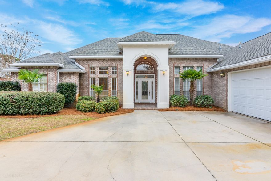 This rare gem hits all the marks - 4 bedrooms, 3 full baths, multiple living spaces, 3 car garage, enclosed gunite pool and spa, private half acre lot in a guard gated Bluewater Bay enclave! Inside find soaring 10-14 foot ceilings, extensive crown moulding and millwork, generously proportioned spaces, thoughtful built-ins, gorgeous pecan hardwood flooring, stainless steel appliances and granite counters in the chef's kitchen and all 3 full baths. Enjoy resort-style living at home in the backyard oasis, complete with freeform pool and spa, and substantial paver patio space - perfect for grilling, lounging, and taking in the peaceful lake beyond. A separate fenced area off the pool enclosure is perfect for pets and play! Above the 3-car garage, a massive walk up finished storage space will..