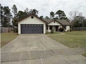 AS-IS South of I-10 this house has a very open floor plan that lives larger than the square footage. Great room has neutral laminate flooring that will go with everything, large double sliding glass doors to enjoy views of the fenced over-sized back yard. The kitchen has stainless steel appliances which include a smooth top stove and side by side refrig and tile back splash. Tile is in the kitchen, dining, hall and bathrooms. Split bedroom floor plan. Garage has a utility sink. Buyer to verify all room sizes and sq.ft.