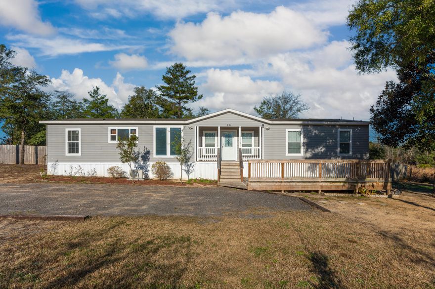 Looking for a great home in this market, this 3/ 2 and a half bath mobile home on 3 lots located in the Mossy Head community has all the extras! The home has a large living room that connects to the open dining and kitchen, tons of built ins and amazing charm is very welcoming. The master suite offers you the opportunity to have a nursery of office as well as tons of space with a large closest and amazing bath that includes separate shower and tub. The home offers a half bath for guest and the additional 2 bedrooms share a jack and jill bath! The laundry room welcomes you from back yard and includes a great sink perfect for cleaning up after playing outside, home has a great built on deck, privacy fenced back yard, and 2 storage buildings in the yard - this one has it all! Move in ready!