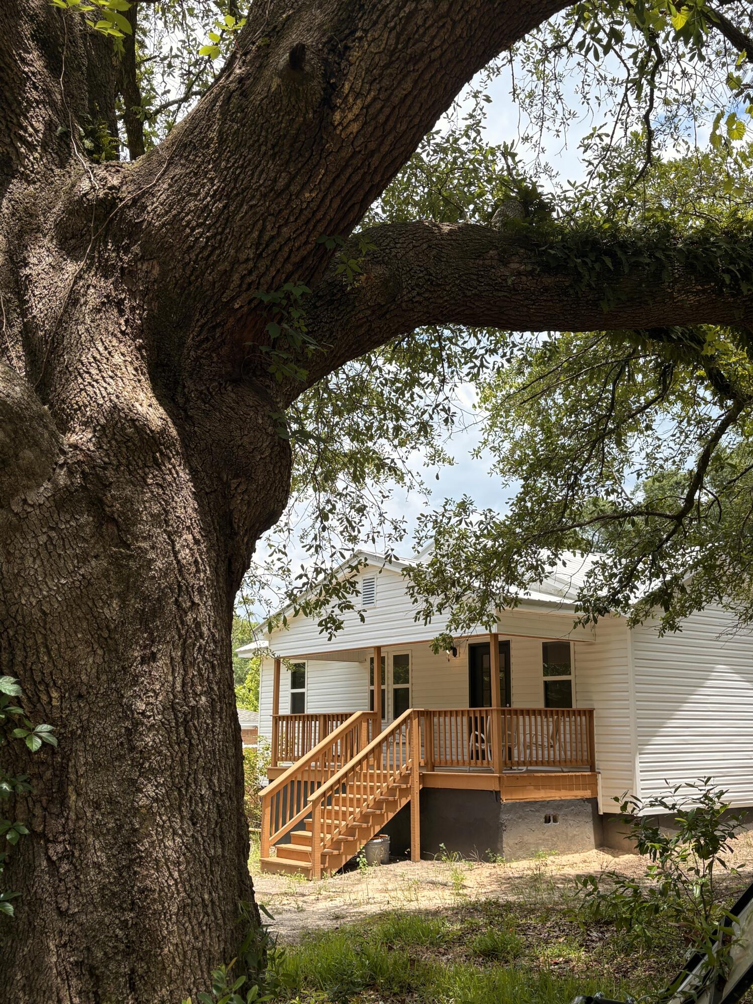 Welcome to this beautifully remodeled 3-bedroom, 2-bathroom home located in a quiet, family-friendly neighborhood near downtown Crestview. With convenient access to the interstate and two nearby military bases, this move-in-ready home offers both comfort and accessibility. Just a short walk from schools and churches, and only minutes from the city center, this home combines convenience with community charm. Inside, you'll find a spacious master suite with a walk-in closet and private bath, while the additional bedrooms share a Jack-and-Jill bathroom. Fresh carpet flows through the living areas, and the kitchen features a new appliances. The generously sized yard is mostly fenced and ready for your finishing touches.