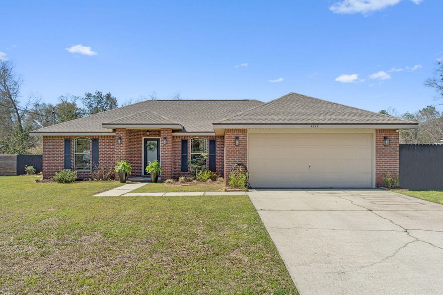POOL. Stunning 4-Bedroom Home in Pace, FL -Modern Upgrades & Private Backyard OasisLocated on a quiet dead-end street in Pace, Florida, this beautifully remodeled 4-bedroom, 2-bath home offers 1,442 sq. ft. of stylish and functional living space. Renovated in 2021, the home features vaulted ceilings in the den and kitchen, creating a bright and open feel. The gorgeous kitchen boasts gray shaker cabinets, quartz countertops, and stainless steel appliances, while a dry bar in the dining room makes entertaining a breeze. Luxury vinyl plank flooring runs throughout, providing both durability and modern appeal.The spacious master suite is a true retreat, complete with a tray ceiling, his and her walk-in closets, and a spa-like master bath featuring a large tiled shower and double vani Major updates include a new roof (2021), HVAC (2022), and water heater (2022), ensuring long-term peace of mind.

Step outside to your massive backyard, perfect for relaxation and entertainment. Enjoy the huge above-ground pool with a surrounding deck, a pergola-covered patio, and a privacy fence for added seclusion. A separate fenced side yard is ideal for pets.

This move-in-ready home offers modern upgrades, thoughtful design, and plenty of space inside and out. Don't miss this incredible opportunity in highly sought-after Pace, FLschedule your showing today!
