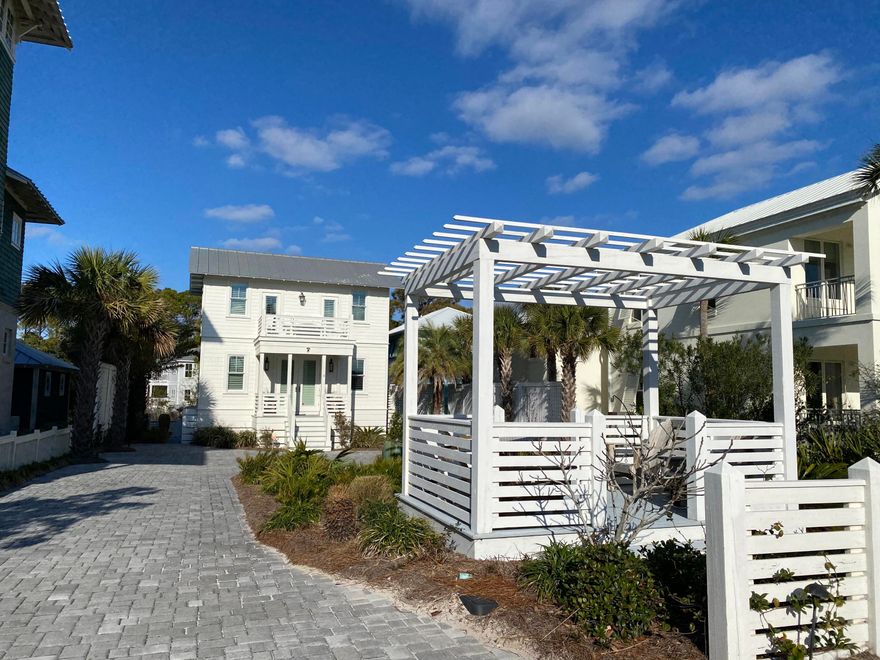This beautifully, well constructed guest house is located on a large ''one back'' lot across the street from the Sandyshore Beach Access. It consists of 2 bedrooms with 2-1/2 baths. The kitchen/dining/living area is an open plan and it has exceptional finishes. The guest house has a large porch on the first floor and a large open deck on the second floor of the house. The exterior of the house is a combination of Hardie Plank lap siding and shingles. There is ample room on this lot to construct a main house with a total of 2,900+ square feet, heated and cooled. The total square footage allowed, for the main house and including porches, can be over 4,100 square feet.