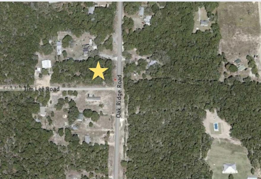 With over 1 acre of land, this property includes a well and septic tank.  Build a new home or install a manufactured home. Buyer must confirm all measurements.