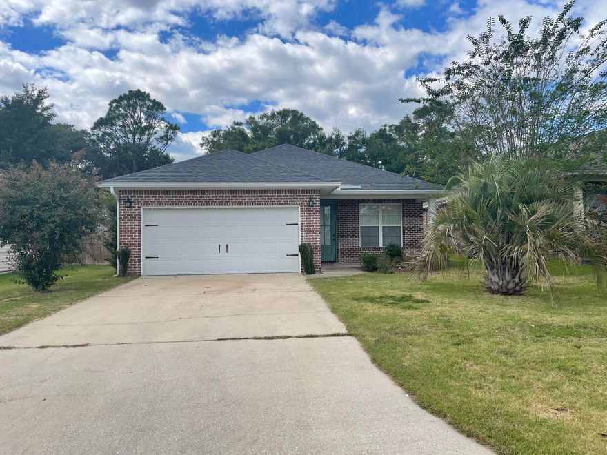Available for move-in November 1st! Like new 4-bedroom/2bath home conveniently located in Niceville! EASY ACCESS TO THE BASES, SCHOOLS, SHOPPING, AND THE BEACHES! Open concept floor plan, great for entertaining. Beautiful hand-scraped hardwood floors, crown molding in main living area, high ceilings, & large windows with custom blinds. The kitchen features granite counters, SS appliances, beautiful all wood cabinetry & a breakfast bar.  Primary bedroom is tucked back for privacy with a walk in closet, and well-appointed bath. Three more bedrooms and a bath on the other side of home. Cover back porch and yard is privacy fenced.