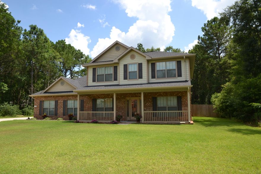 Make this your DREAM home! Seller is offering up to $6,000 in closing cost assistance with full price offer. 5 Bedrooms, 2.5 Bathrooms, Chef's Kitchen, Luxury Master Suite, Office, Formal Dining Room, 2 Porches, and 5th Bedroom is great for a Media Room! Fresh landscaping and a fully sodded yard with sprinkler systems is easy to maintain. Chef's Kitchen has GRANITE countertops, DOUBLE Ovens, GAS Range, Pantry, Island with Breakfast Bar, easy close drawers, and Stainless Appliances. View of the Great Room from the Kitchen makes it easy to be a part of the ACTION! Powder Room is convenient to the Great Room and is located next to the Garage Entrance. PRIVATE Master Suite located off the Great Room. Master Bedroom has a sitting room and walk-in-closet.